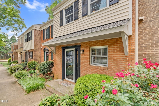 6311 New Market Way, Raleigh, NC 27615 - doorway to property featuring brick siding