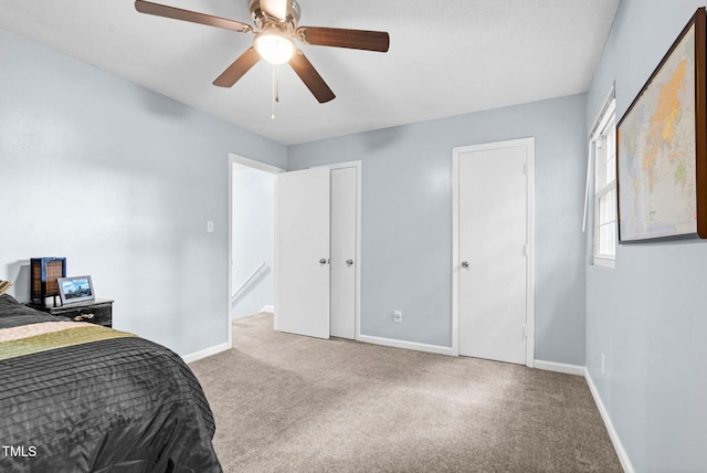 6311 New Market Way, Raleigh, NC 27615 - carpeted bedroom with baseboards and ceiling fan