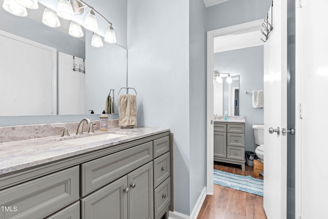 6311 New Market Way, Raleigh, NC 27615 - bathroom featuring vanity and wood finished floors