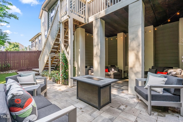 5116 Trembath Ln, Cary, NC 27519 - view of patio with an outdoor living space with a fire pit and stairway