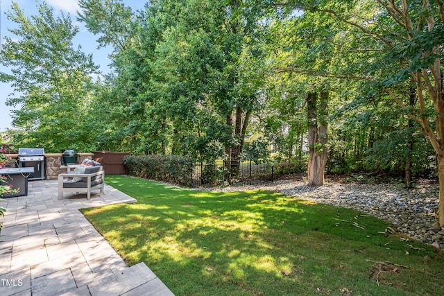 5116 Trembath Ln, Cary, NC 27519 - fenced yard with a patio