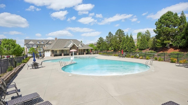 5116 Trembath Ln, Cary, NC 27519 - community pool featuring a patio