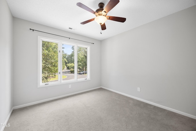 122 Woodbridge Ln, Chapel Hill, NC 27514 - carpeted empty room with baseboards and a ceiling fan