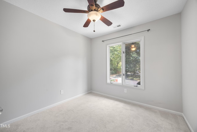 122 Woodbridge Ln, Chapel Hill, NC 27514 - empty room with carpet, a ceiling fan, and a textured ceiling