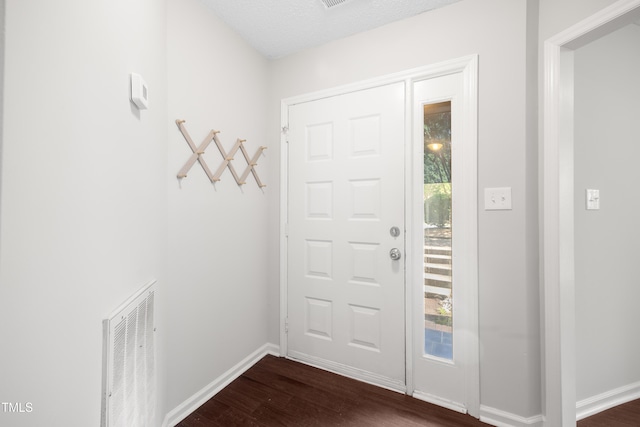 122 Woodbridge Ln, Chapel Hill, NC 27514 - entrance foyer with dark wood finished floors