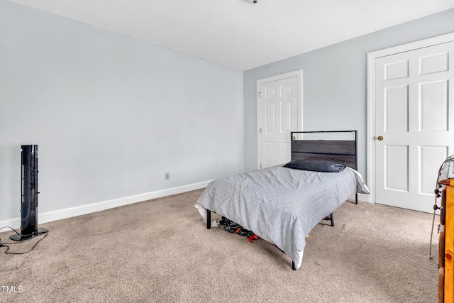 1200 Cambridge Rd NW, Wilson, NC 27896 - carpeted bedroom with baseboards
