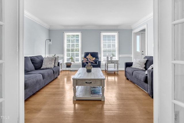 1200 Cambridge Rd NW, Wilson, NC 27896 - living area featuring crown molding and light wood-style flooring