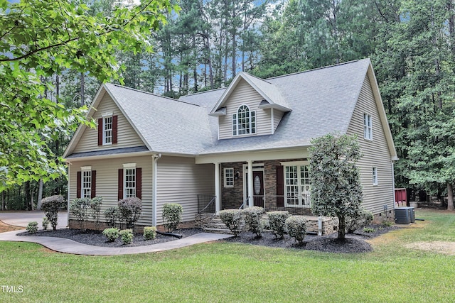 2103 Troys Trl, Franklinton, NC 27525 - view of front of house featuring covered porch, roof with shingles, and a front yard