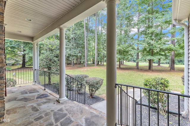 2103 Troys Trl, Franklinton, NC 27525 - covered porch with a lawn and view of wooded area
