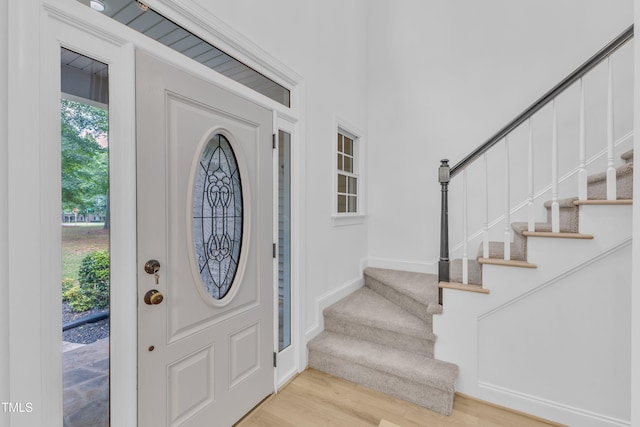 2103 Troys Trl, Franklinton, NC 27525 - foyer entrance featuring stairway and wood finished floors