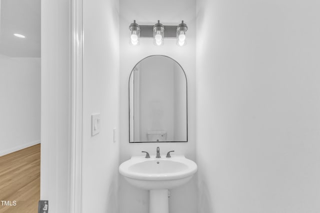 2103 Troys Trl, Franklinton, NC 27525 - bathroom featuring wood finished floors and baseboards