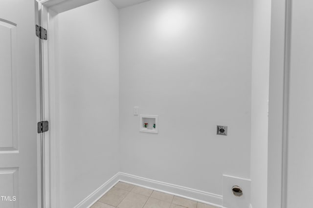 2103 Troys Trl, Franklinton, NC 27525 - laundry area with hookup for a washing machine, hookup for an electric dryer, and light tile patterned floors