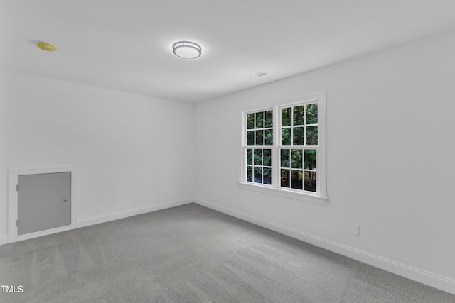 2103 Troys Trl, Franklinton, NC 27525 - carpeted spare room featuring baseboards and a smoke detector