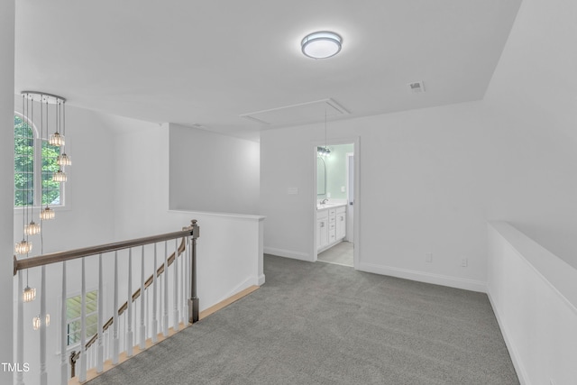 2103 Troys Trl, Franklinton, NC 27525 - spare room with attic access and carpet flooring