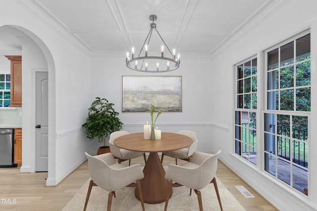 2103 Troys Trl, Franklinton, NC 27525 - dining room featuring light wood-style floors, arched walkways, plenty of natural light, coffered ceiling, and ornamental molding