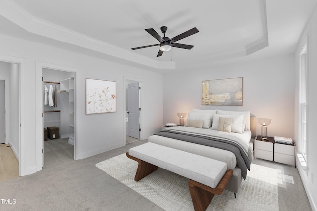 2103 Troys Trl, Franklinton, NC 27525 - bedroom with a tray ceiling, light colored carpet, a spacious closet, ornamental molding, and ceiling fan