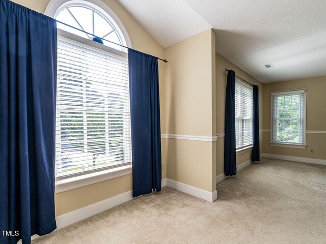 103 Glenstone Ln, Cary, NC 27518 - carpeted spare room featuring baseboards and a textured ceiling