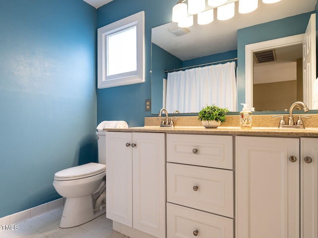 103 Glenstone Ln, Cary, NC 27518 - full bathroom with double vanity, tile patterned flooring, and a shower with curtain