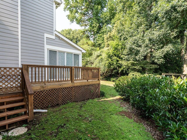 103 Glenstone Ln, Cary, NC 27518 - view of grassy yard featuring a wooden deck