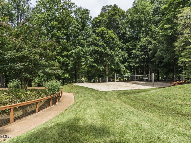 103 Glenstone Ln, Cary, NC 27518 - surrounding community with volleyball court and a yard