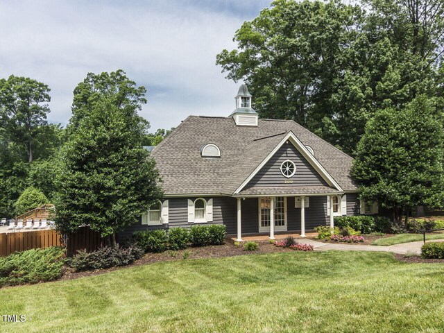 103 Glenstone Ln, Cary, NC 27518 - view of front of property with a shingled roof and covered porch