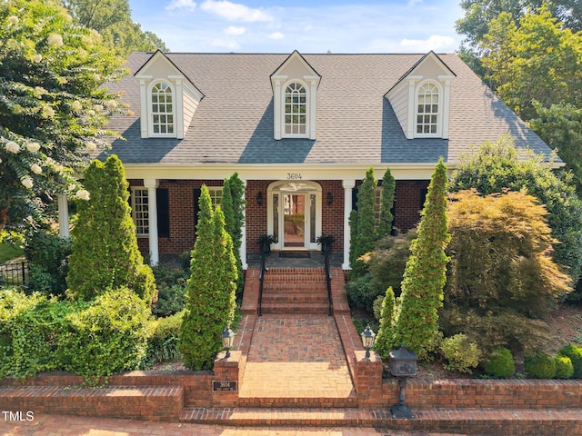 3604 Eden Croft Dr, Raleigh, NC 27612 - cape cod home featuring roof with shingles and brick siding