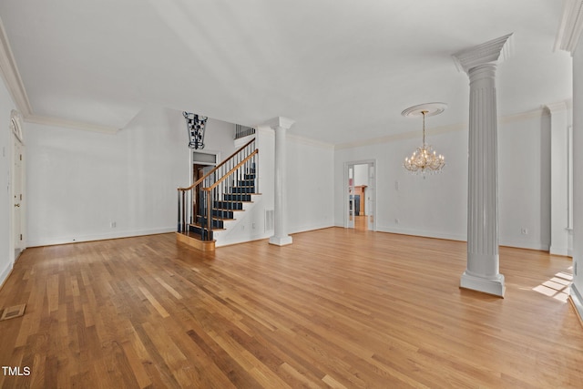 3604 Eden Croft Dr, Raleigh, NC 27612 - unfurnished living room with decorative columns, light wood-type flooring, stairway, ornamental molding, and a chandelier