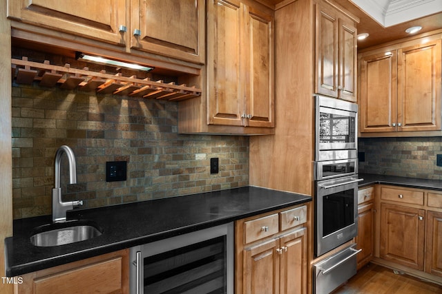 3604 Eden Croft Dr, Raleigh, NC 27612 - kitchen featuring backsplash, wine cooler, dark countertops, and appliances with stainless steel finishes