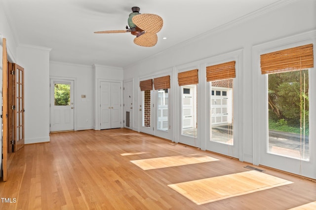 3604 Eden Croft Dr, Raleigh, NC 27612 - spare room with light wood-type flooring, ornamental molding, and a ceiling fan