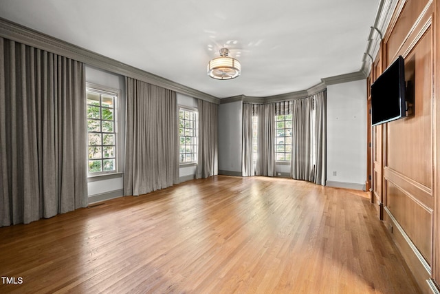 3604 Eden Croft Dr, Raleigh, NC 27612 - empty room with ornamental molding and light wood-style floors