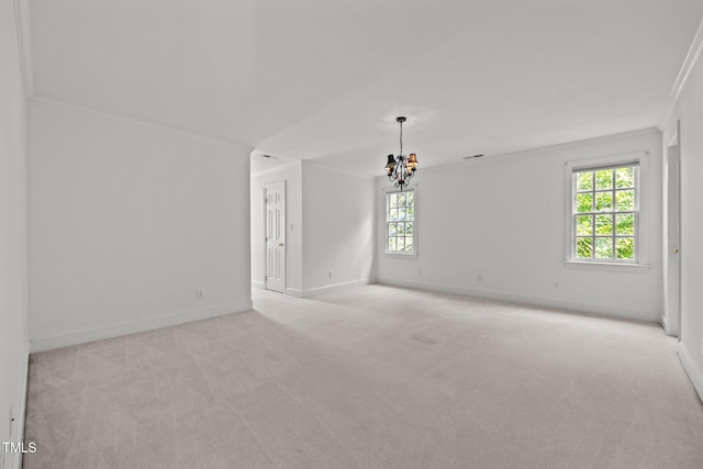 3604 Eden Croft Dr, Raleigh, NC 27612 - unfurnished room featuring light colored carpet, a chandelier, plenty of natural light, and crown molding