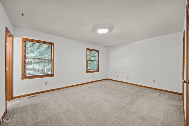 12501 Hardee Rd, Raleigh, NC 27614 - unfurnished room with light colored carpet and a textured ceiling