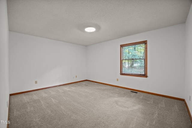 12501 Hardee Rd, Raleigh, NC 27614 - carpeted spare room featuring baseboards and a textured ceiling