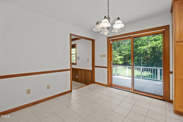 12501 Hardee Rd, Raleigh, NC 27614 - unfurnished room with a chandelier and a wainscoted wall