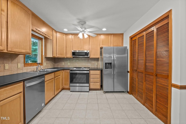 12501 Hardee Rd, Raleigh, NC 27614 - kitchen with appliances with stainless steel finishes, dark countertops, backsplash, recessed lighting, and ceiling fan