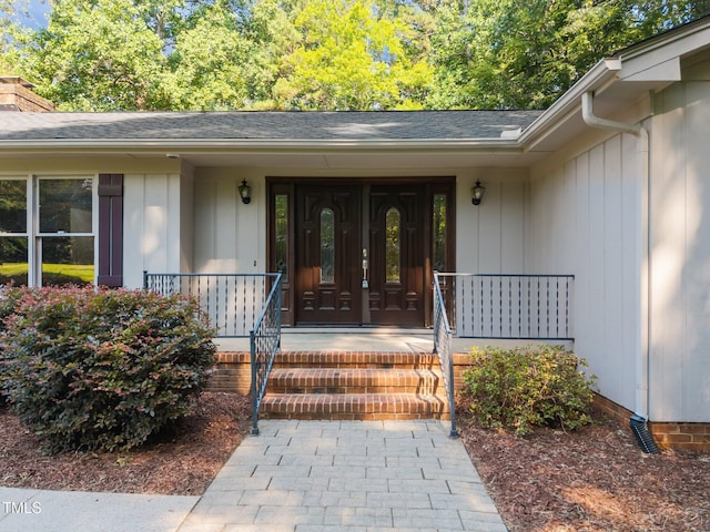 12501 Hardee Rd, Raleigh, NC 27614 - view of exterior entry featuring covered porch and a shingled roof