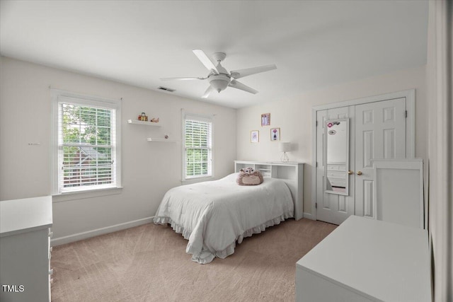 102 Barometer Ln, Cary, NC 27513 - bedroom with multiple windows, light colored carpet, and a ceiling fan