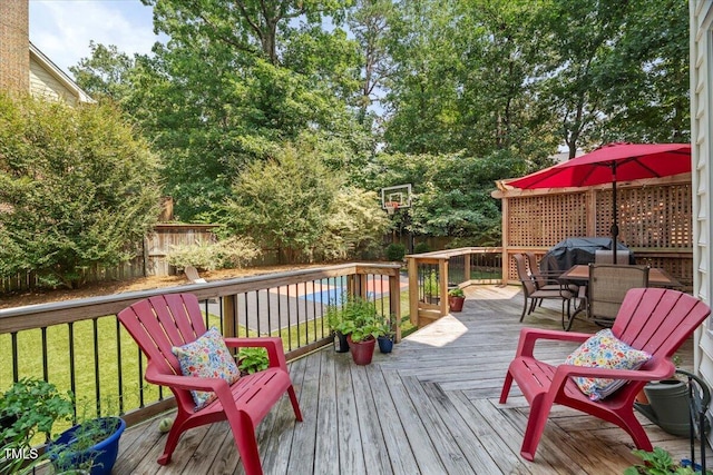 102 Barometer Ln, Cary, NC 27513 - wooden deck with a fenced backyard and a grill