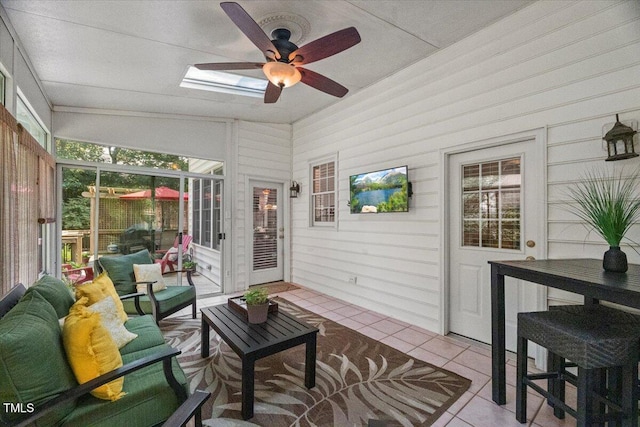 102 Barometer Ln, Cary, NC 27513 - sunroom / solarium featuring a ceiling fan, a skylight, and an outdoor hangout area