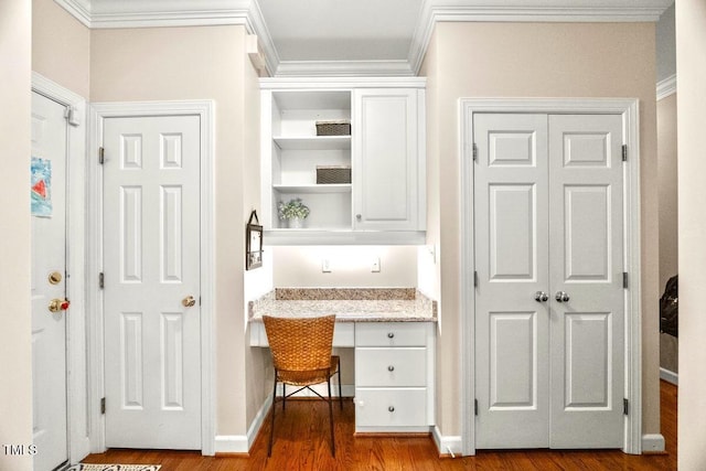 102 Barometer Ln, Cary, NC 27513 - office space featuring built in study area, wood finished floors, and ornamental molding