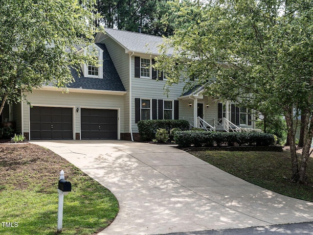 4032 Brook Cross Dr, Apex, NC 27539 - colonial inspired home featuring driveway and roof with shingles