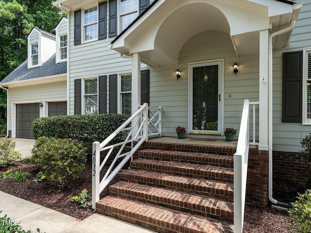 4032 Brook Cross Dr, Apex, NC 27539 - property entrance with an attached garage and concrete driveway