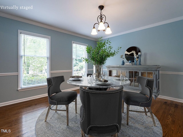 4032 Brook Cross Dr, Apex, NC 27539 - dining room featuring plenty of natural light, wood finished floors, a chandelier, and ornamental molding