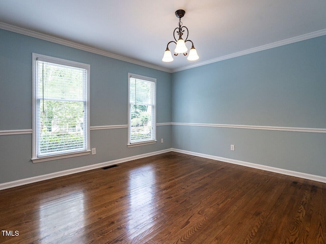 4032 Brook Cross Dr, Apex, NC 27539 - spare room with plenty of natural light, a chandelier, dark wood-type flooring, and ornamental molding