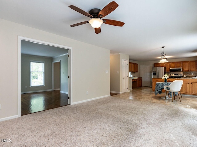 4032 Brook Cross Dr, Apex, NC 27539 - living area featuring light colored carpet and a ceiling fan