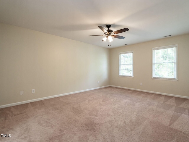 4032 Brook Cross Dr, Apex, NC 27539 - spare room featuring a ceiling fan and light carpet