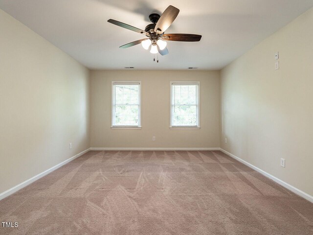 4032 Brook Cross Dr, Apex, NC 27539 - carpeted empty room with a ceiling fan and baseboards