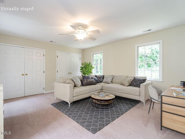 4032 Brook Cross Dr, Apex, NC 27539 - carpeted living area featuring ceiling fan