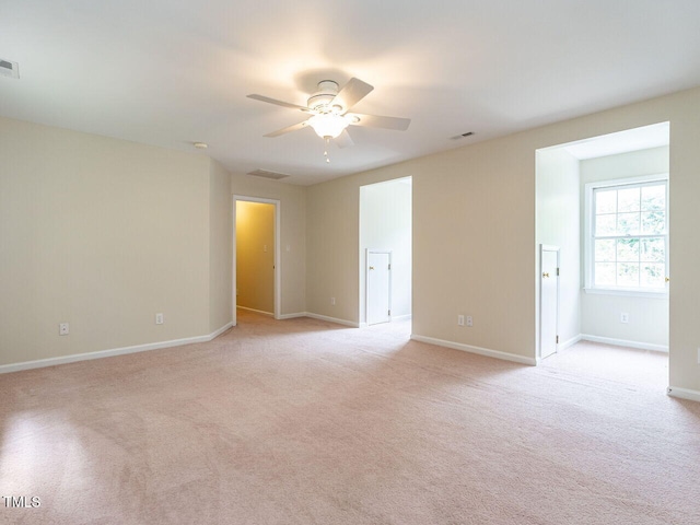 4032 Brook Cross Dr, Apex, NC 27539 - unfurnished room with a ceiling fan and light carpet