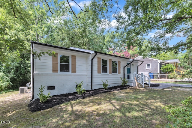 2408 Glascock St, Raleigh, NC 27610 - view of front of house featuring brick siding, a front lawn, and crawl space